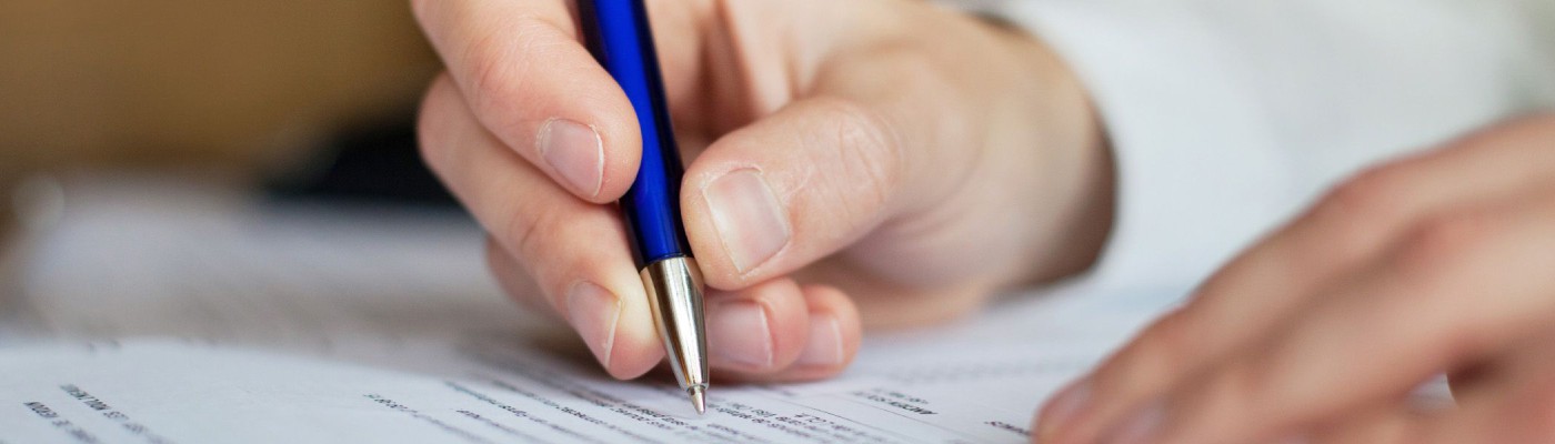 Hand mit Stift